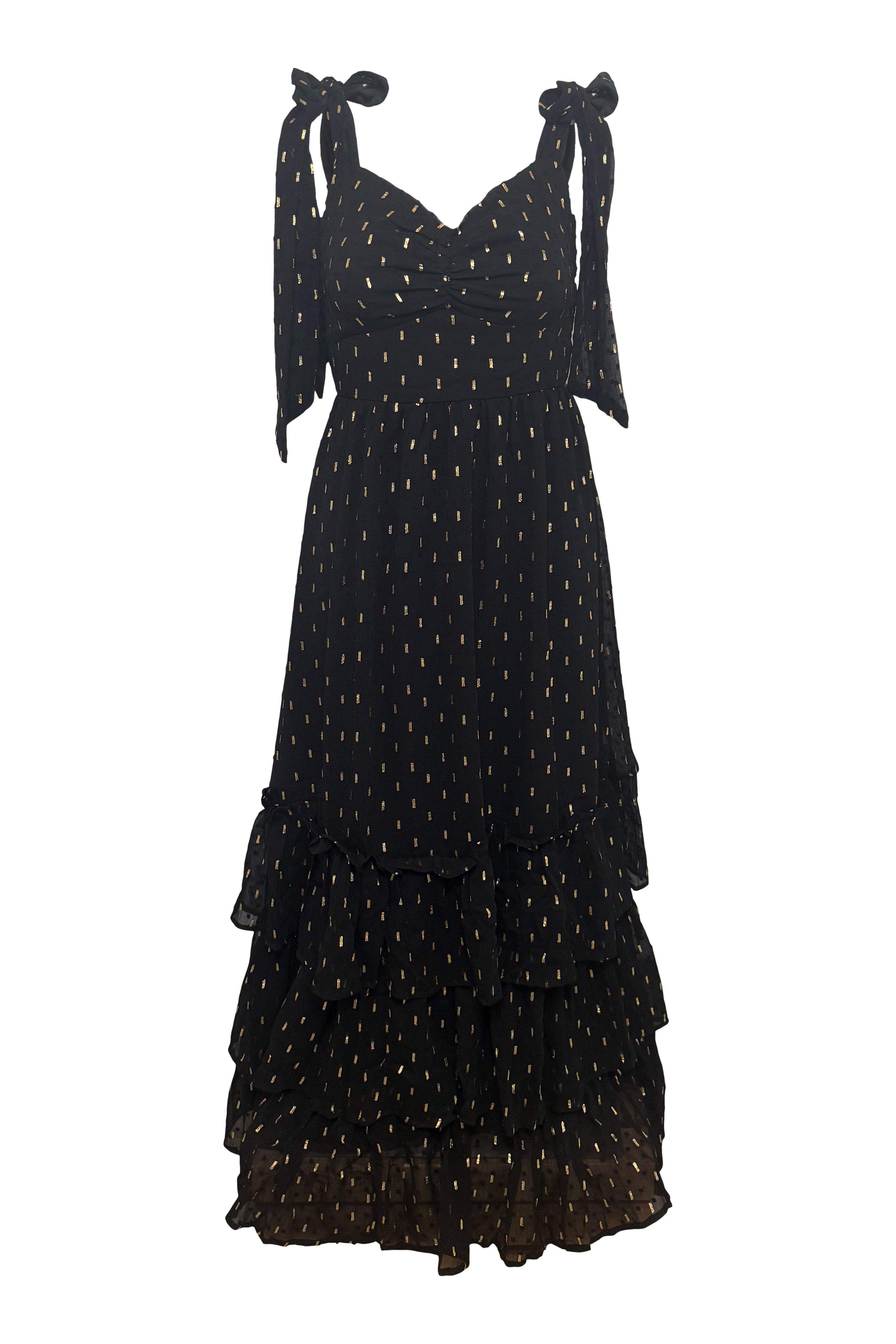 Black polka dot dress with bow straps on a white background