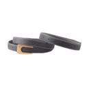 Reversible brown and black belt with a gold buckle on a white background