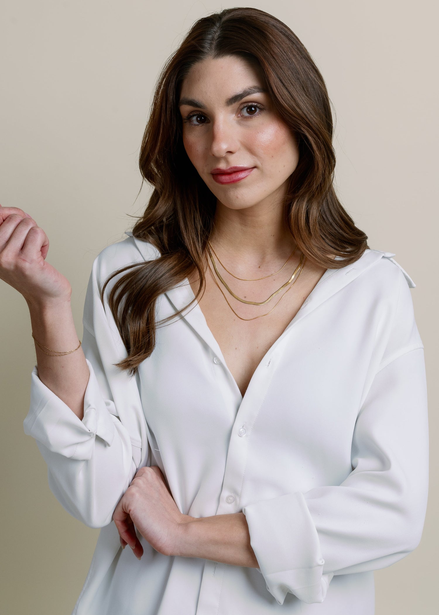 dainty layered gold necklace on model, perfect for everyday or dressy wear.